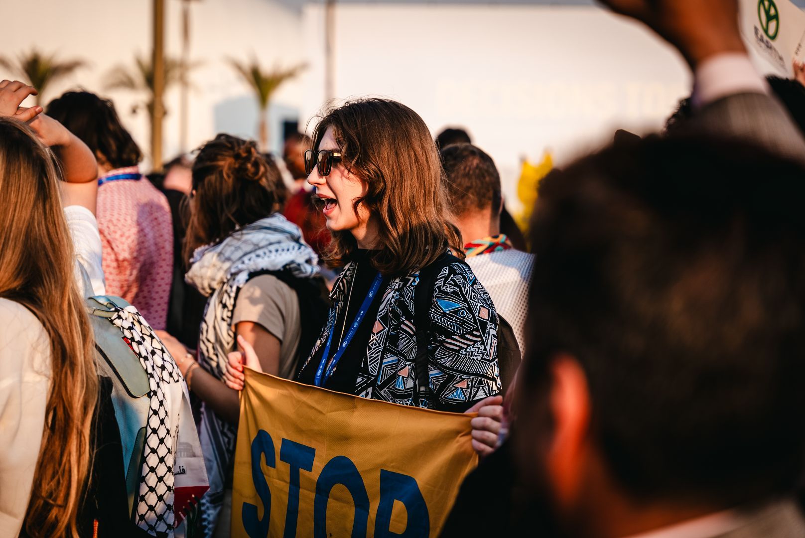 Climate activist in yellow vest at protest event